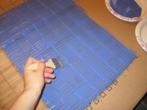 Brush on the blue paint