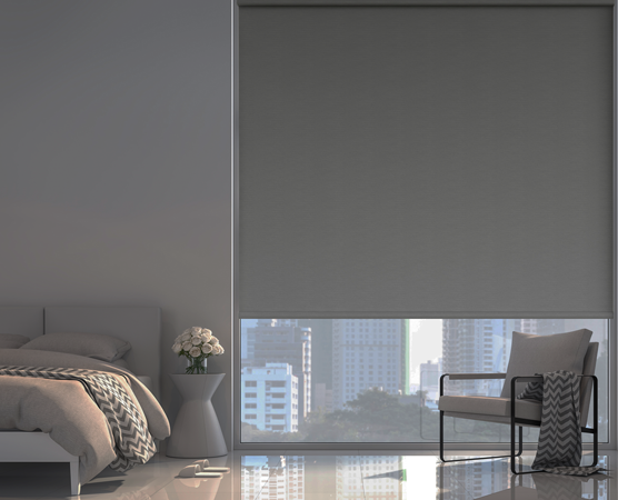 Roller shade in a bedroom
