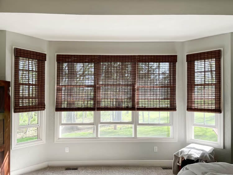 Bamboo shades in a bay window