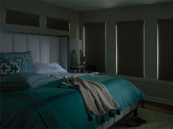 Bedroom with blackout window coverings
