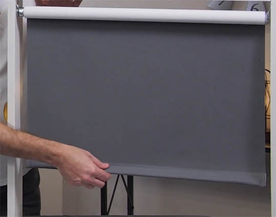 Pulling down a roller shade
