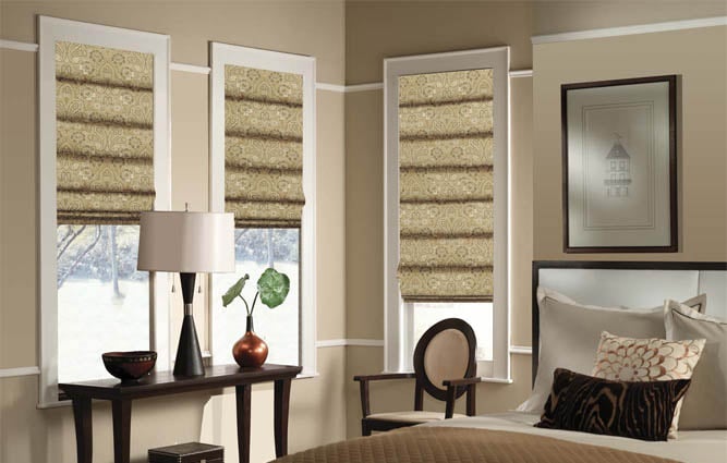 Roman shades in bedroom