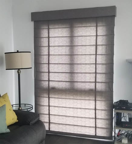Roman shade on a sliding door