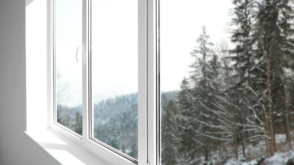 Saving on heating bills with insulating window shades