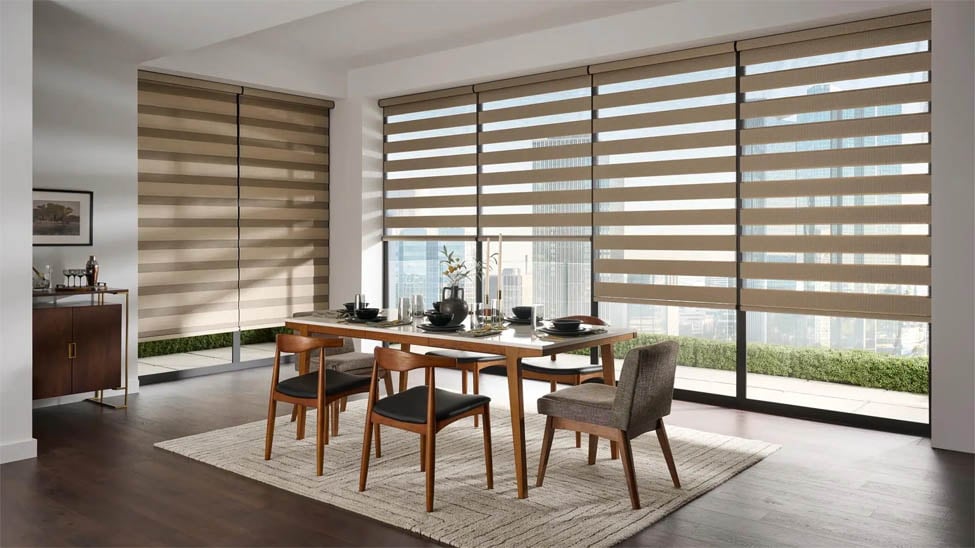 Zebra shades in dining room create a striking style