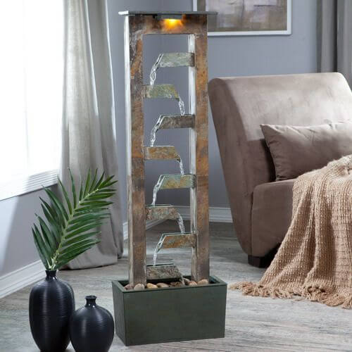 Purchase a small indoor fountain