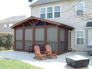 Install outdoor shades to make your deck or patio more comfortable