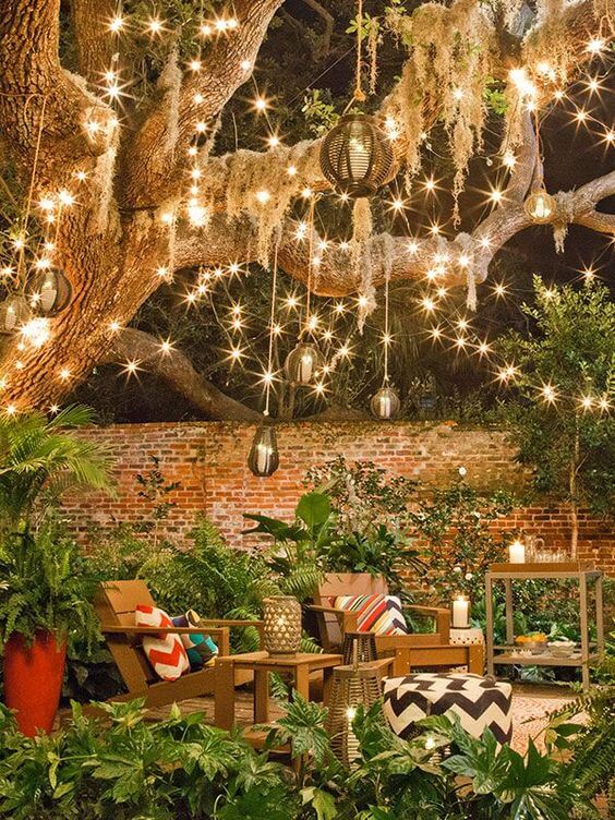String up lights, create lighted walkways, and light torches to create a beautiful nighttime display