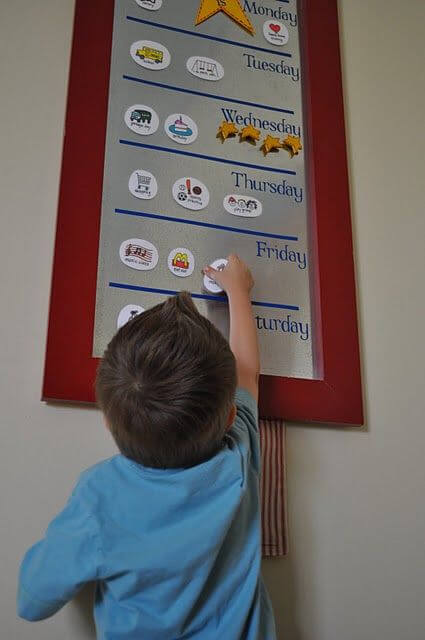 Encourage responsibility by hanging a large calendar or whiteboard on the wall