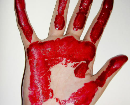 Bloody handprint effect in the window